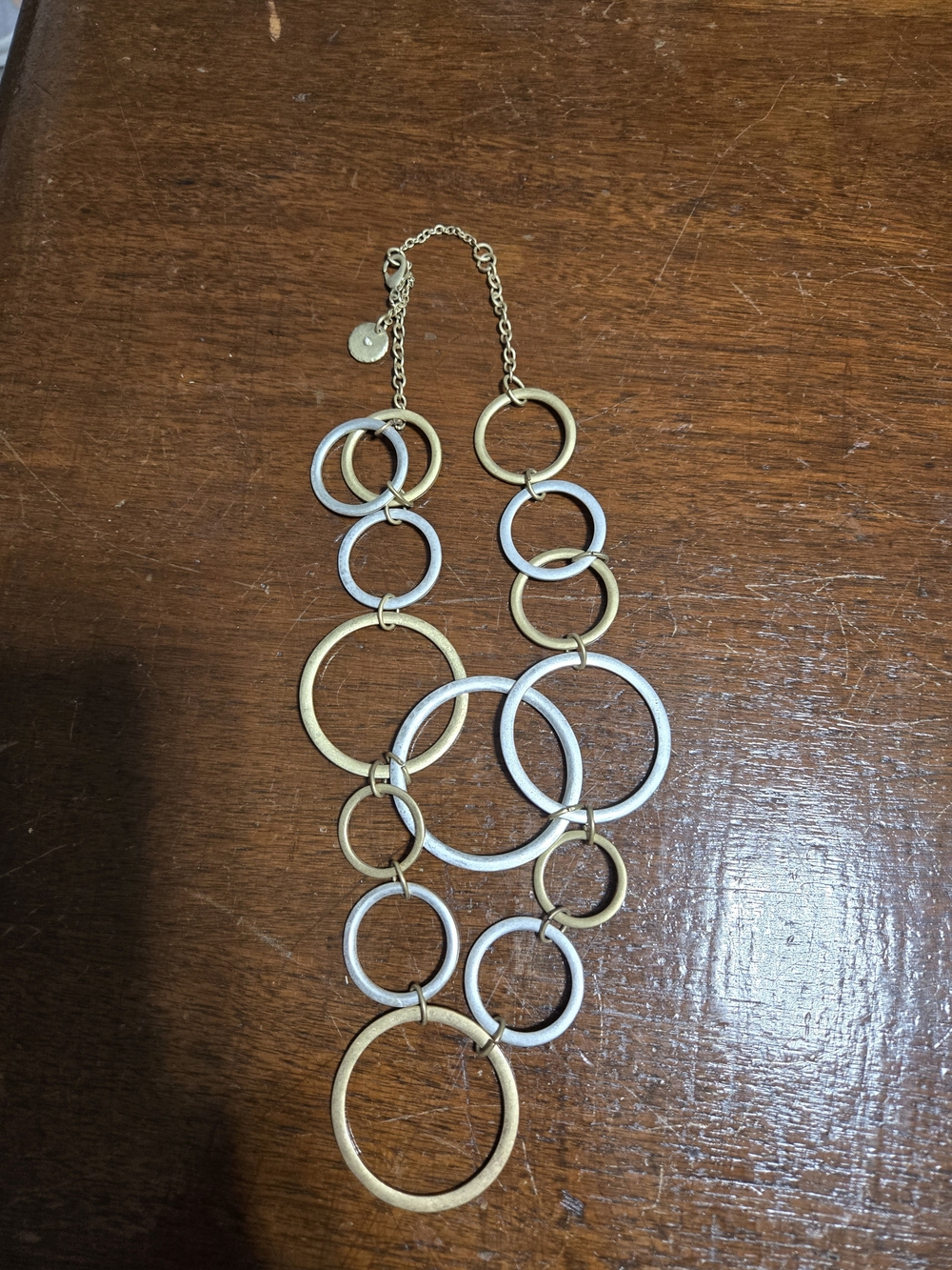 The Sak Gold and Silver Linked Ring Necklace